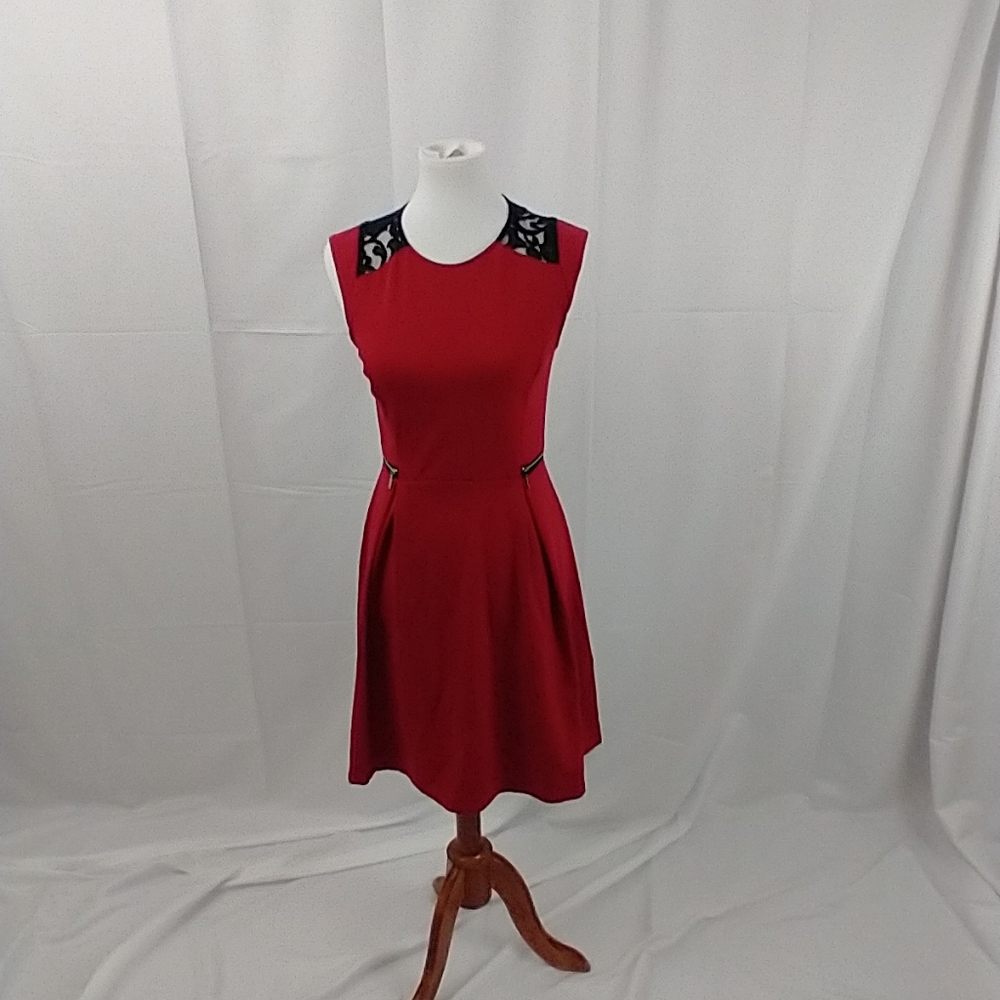 Red and Black Form Fitting Dress, with Lace Back. Size Medium